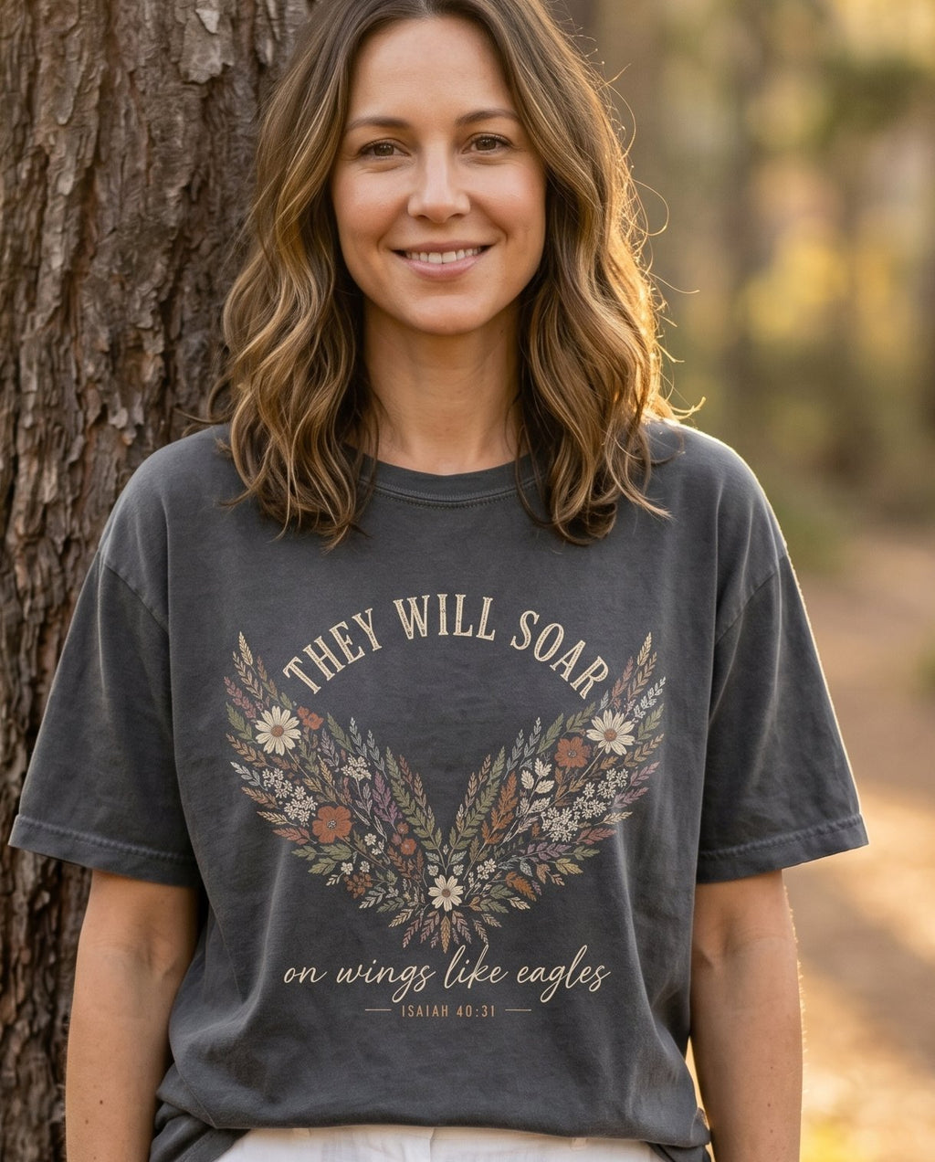 On Wings Like Eagles – Pepper women's Christian tee, lifestyle photo in nature trail – On Wings Like Eagles Isaiah 40:31 soar eagle wings mountain path trail – She Wears Faith
