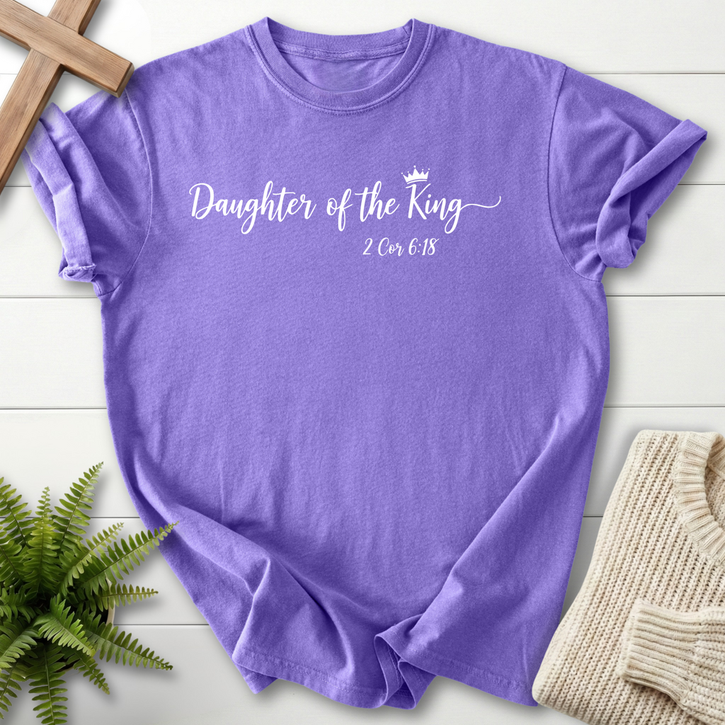 Violet women's faith t-shirt with elegant cursive lettering and a crown illustration, inspired by 2 Corinthians 6:18.