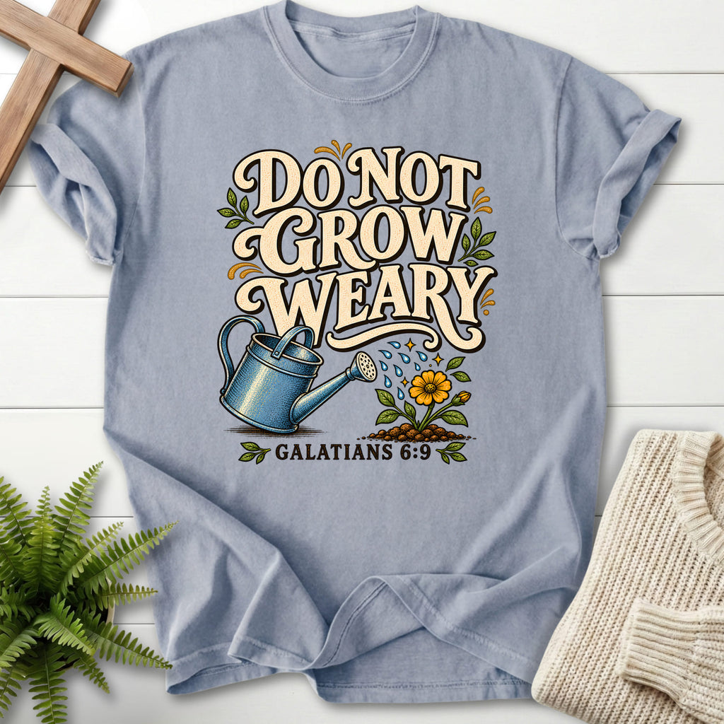 Flat lay of a Granite faith-based tee featuring flower artwork with "Do Not Grow Weary Galatians 6 9 T-Shirt" Galatians 6:9.