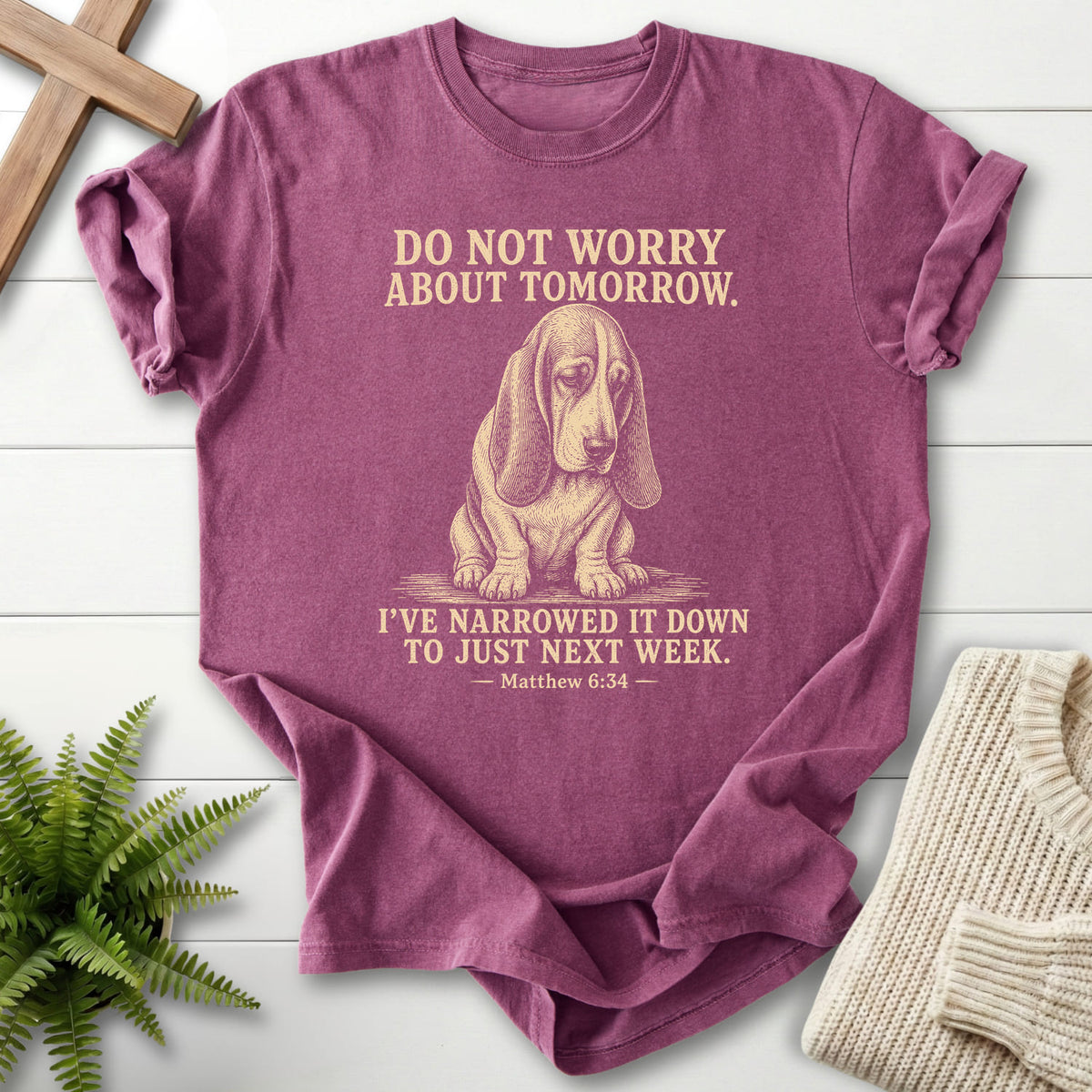Flat lay of a Berry Christian shirt featuring "Do Not Worry About Tomorrow T-Shirt" Matthew 6:34.