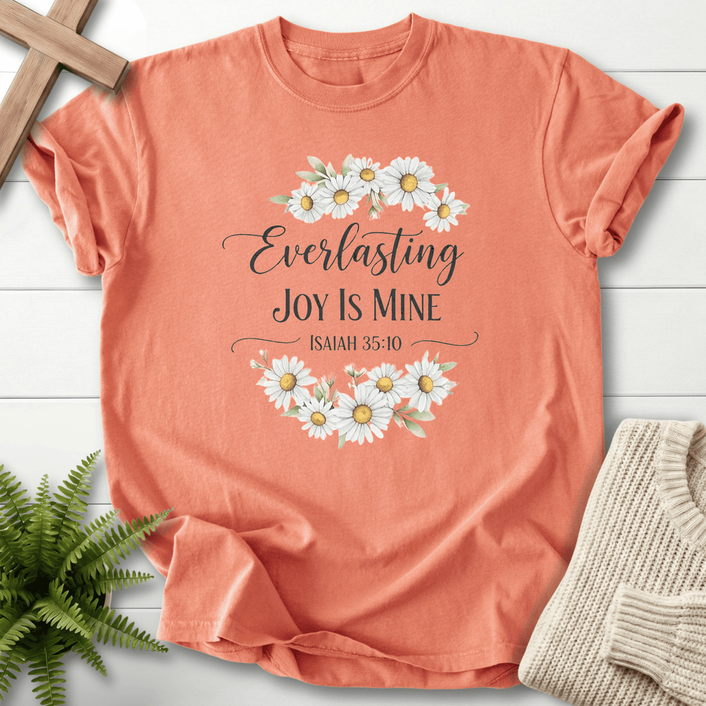 Terracotta women's faith t-shirt with a daisy wreath and scripture text, inspired by Isaiah 35:10.