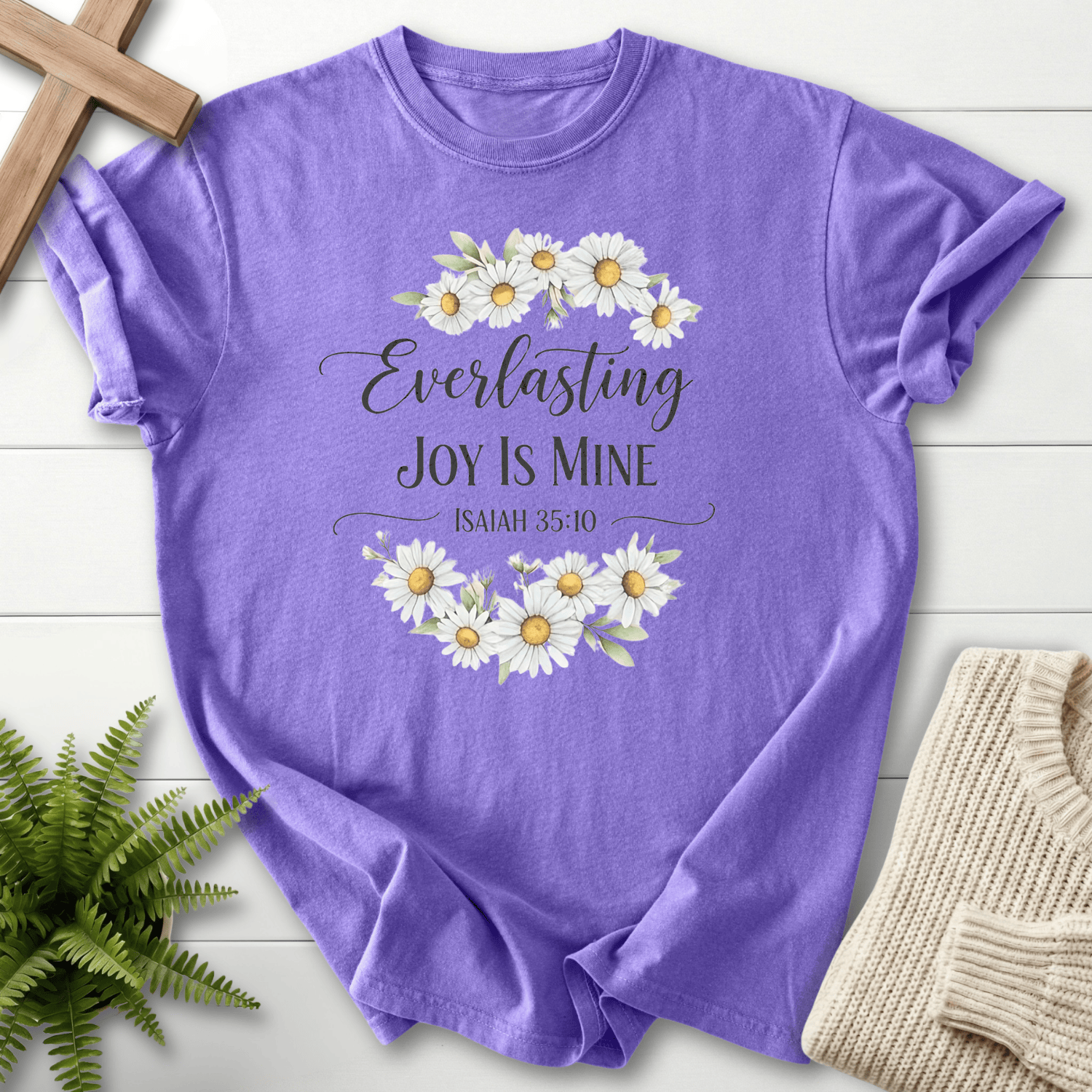 Violet women's faith t-shirt with a white daisy wreath and 'Everlasting Joy Is Mine', inspired by Isaiah 35:10.