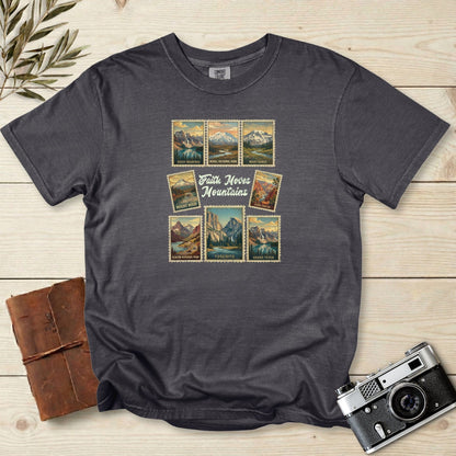 Comfort Colors 1717 pepper Christian women tee featuring a vintage travel-stamp design with US national parks and the phrase ‘Faith Moves Mountains.’ Soft outdoor-inspired Christian tshirt perfect for faith wear and adventure lover