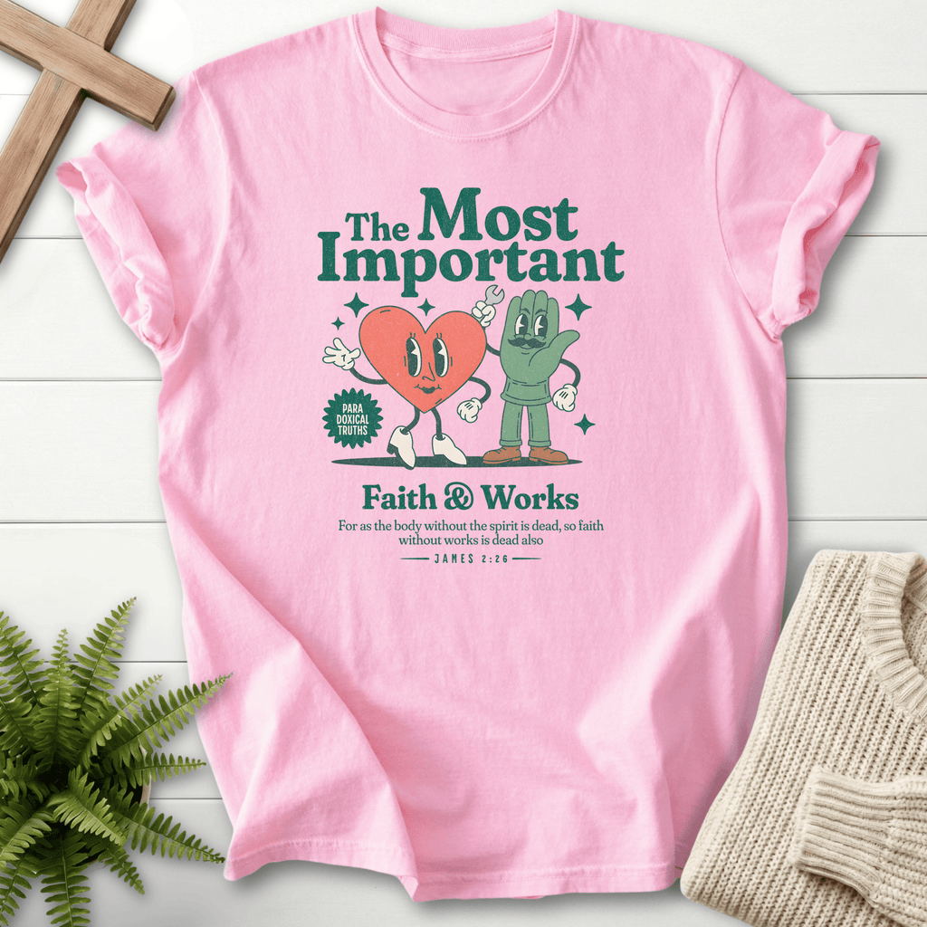 Blossom women's faith t-shirt with a retro cartoon heart and hand design and a Paradoxical Truths badge, inspired by James 2:26.