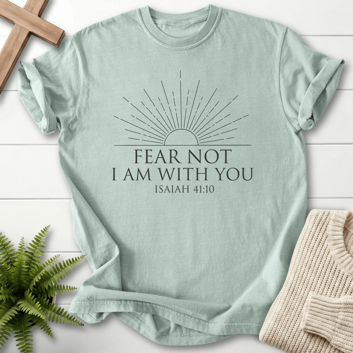 Bay women's faith t-shirt with a minimalist sunburst and the quoted phrase 'Fear Not I Am With You', Isaiah 41:10.