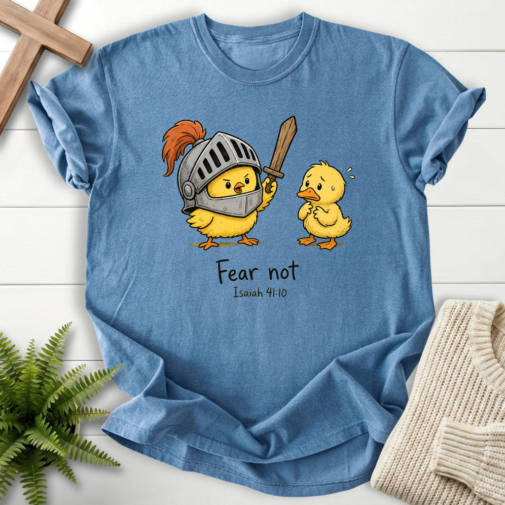 Flatlay of a Blue Jean faith-inspired shirt with "Fear Not Isaiah 41:10 Chick T-Shirt" Isaiah 41:10.