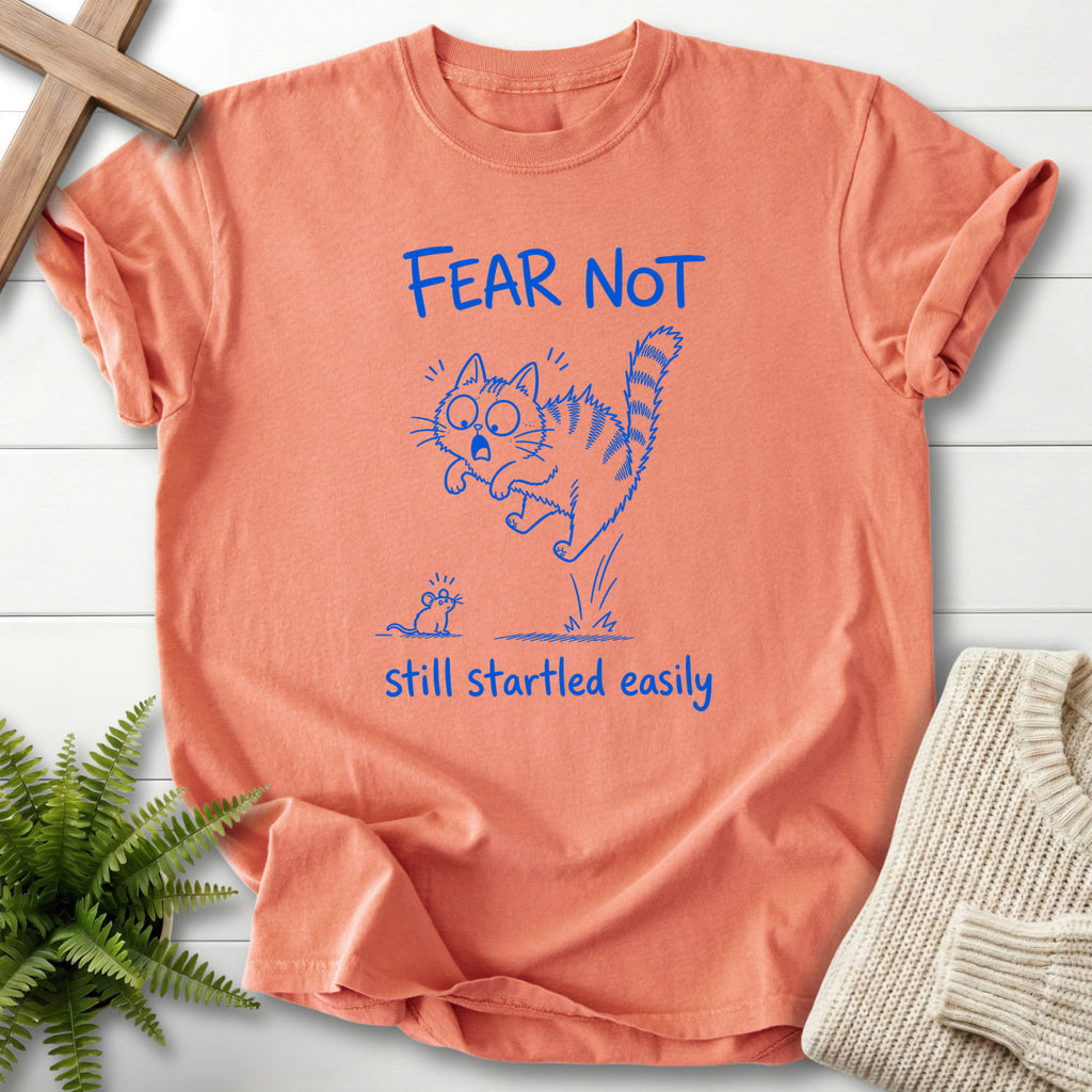 Flat lay of a Terracotta women's Christian tee featuring "Fear Not Still Startled Easily T-Shirt" design.