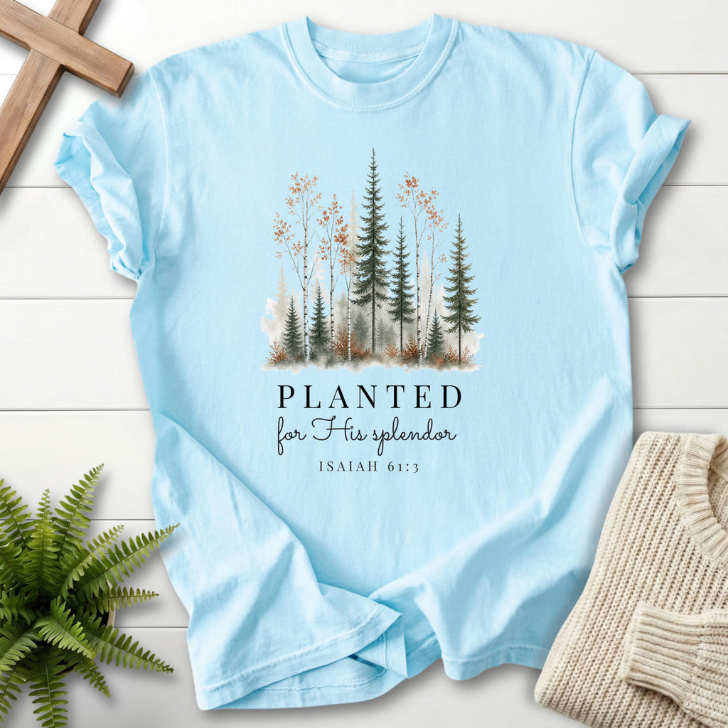 Flat lay of a Chambray women's Christian tee featuring watercolor artwork with "Planted for His Splendor T-Shirt" Isaiah 61:3.