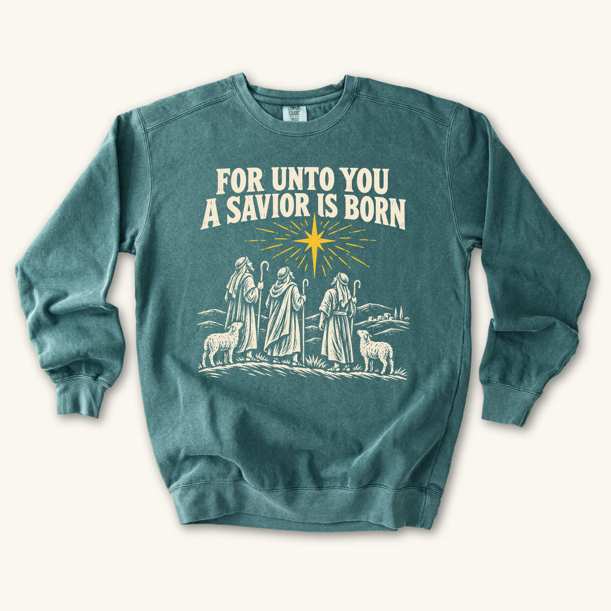 Blue Spruce For Unto You a Savior Is Born sweatshirt flat lay mockup, Christian apparel for women