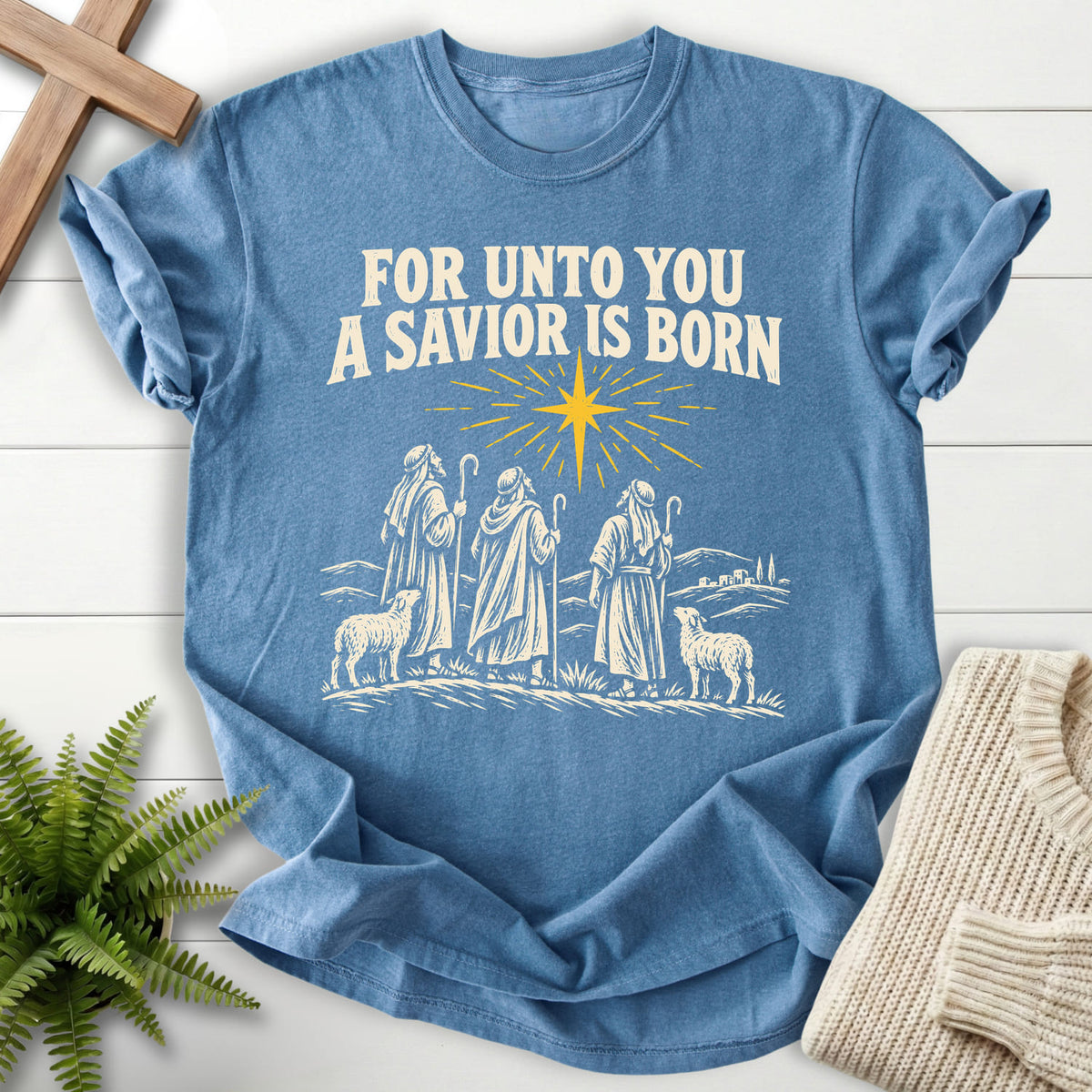 Blue Jean For Unto You a Savior Is Born T-shirt flat lay mockup, Christian apparel for women