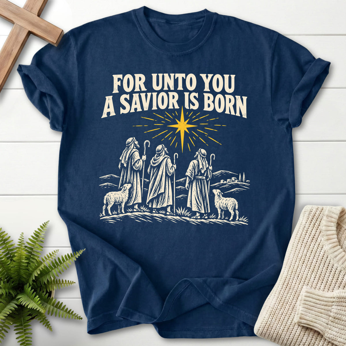 Navy For Unto You a Savior Is Born T-shirt flat lay mockup, Christian apparel for women