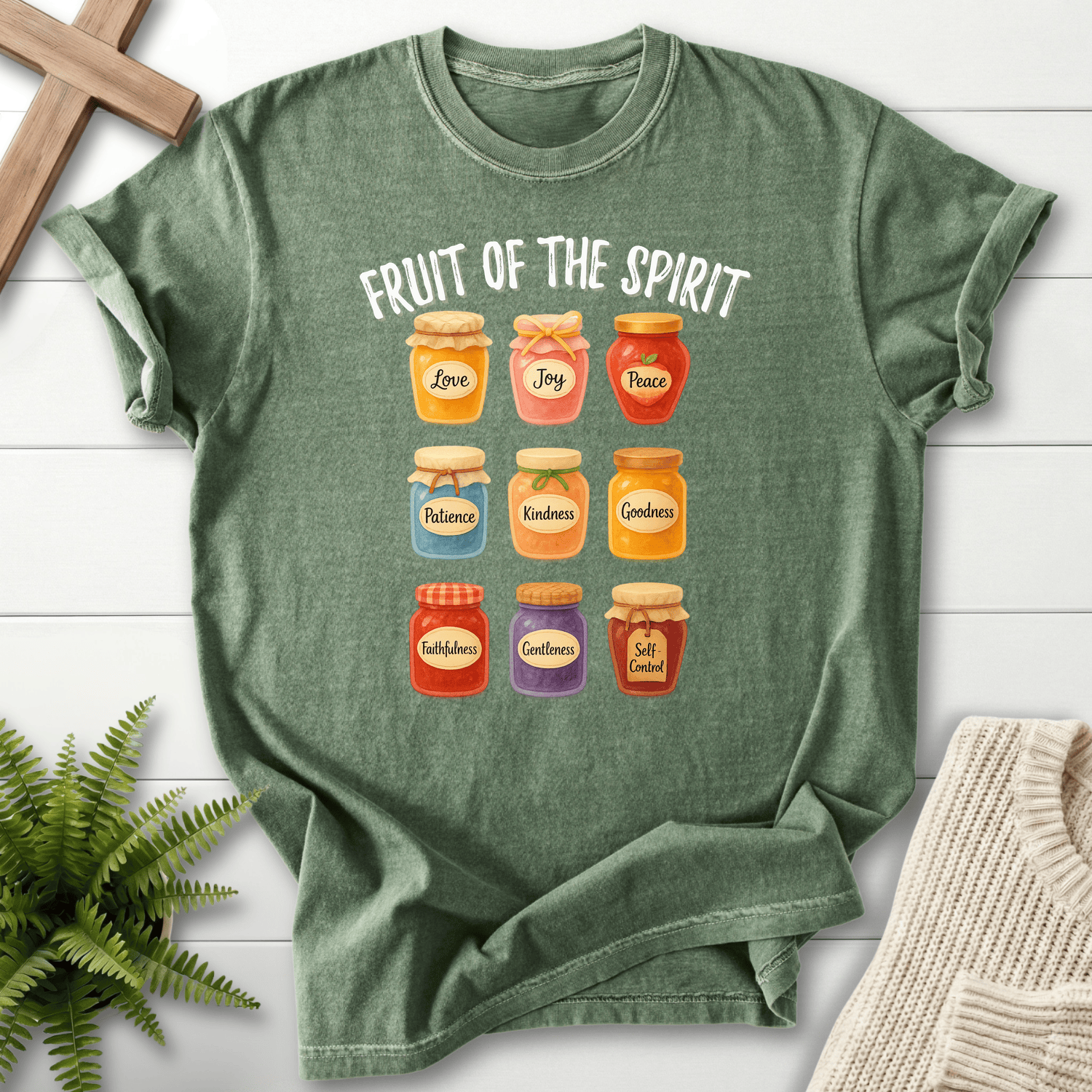 Moss women's faith t-shirt with nine illustrated jam jars showing each fruit of the Spirit.