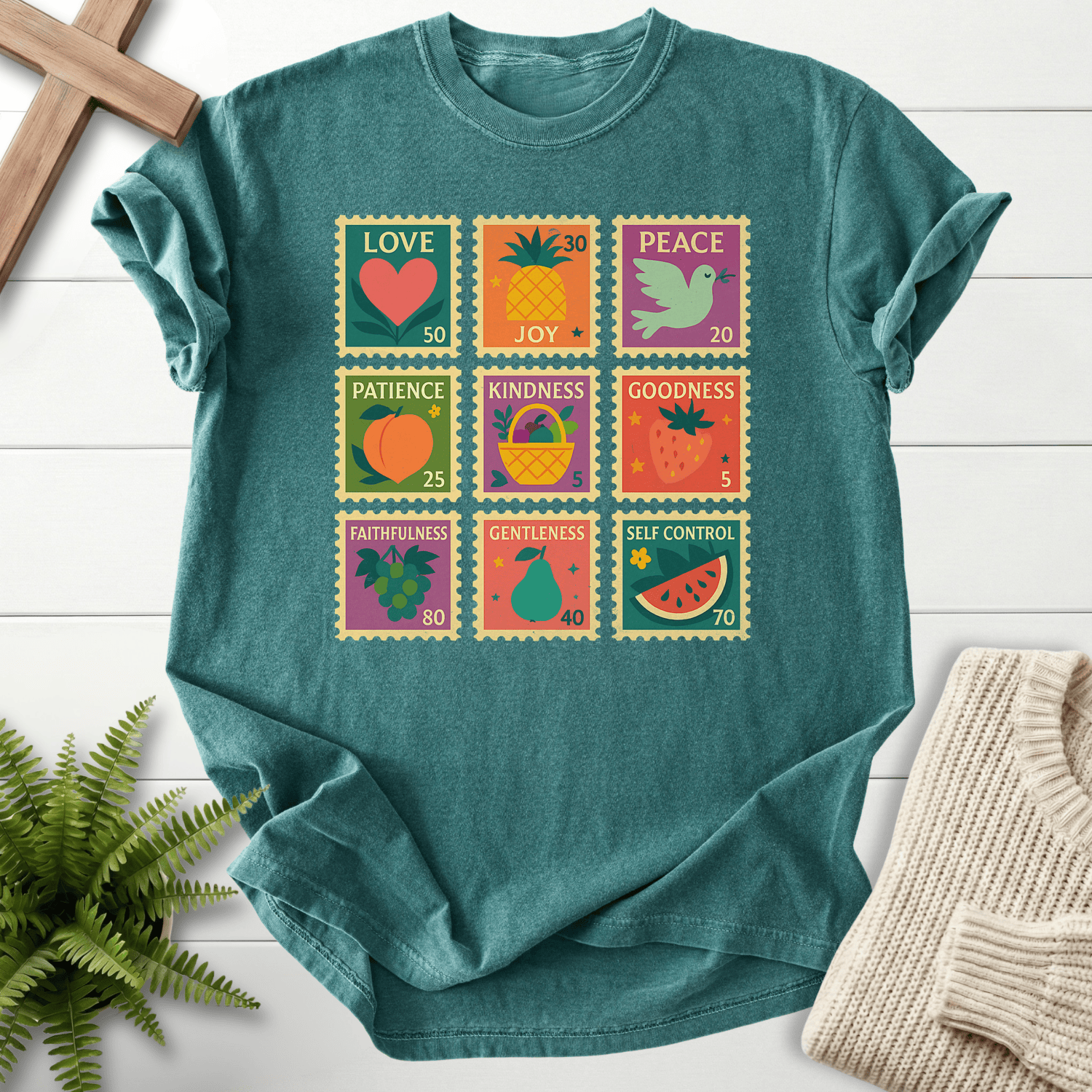 Blue Spruce women's faith t-shirt with nine retro postage stamp designs showing each fruit of the Spirit.