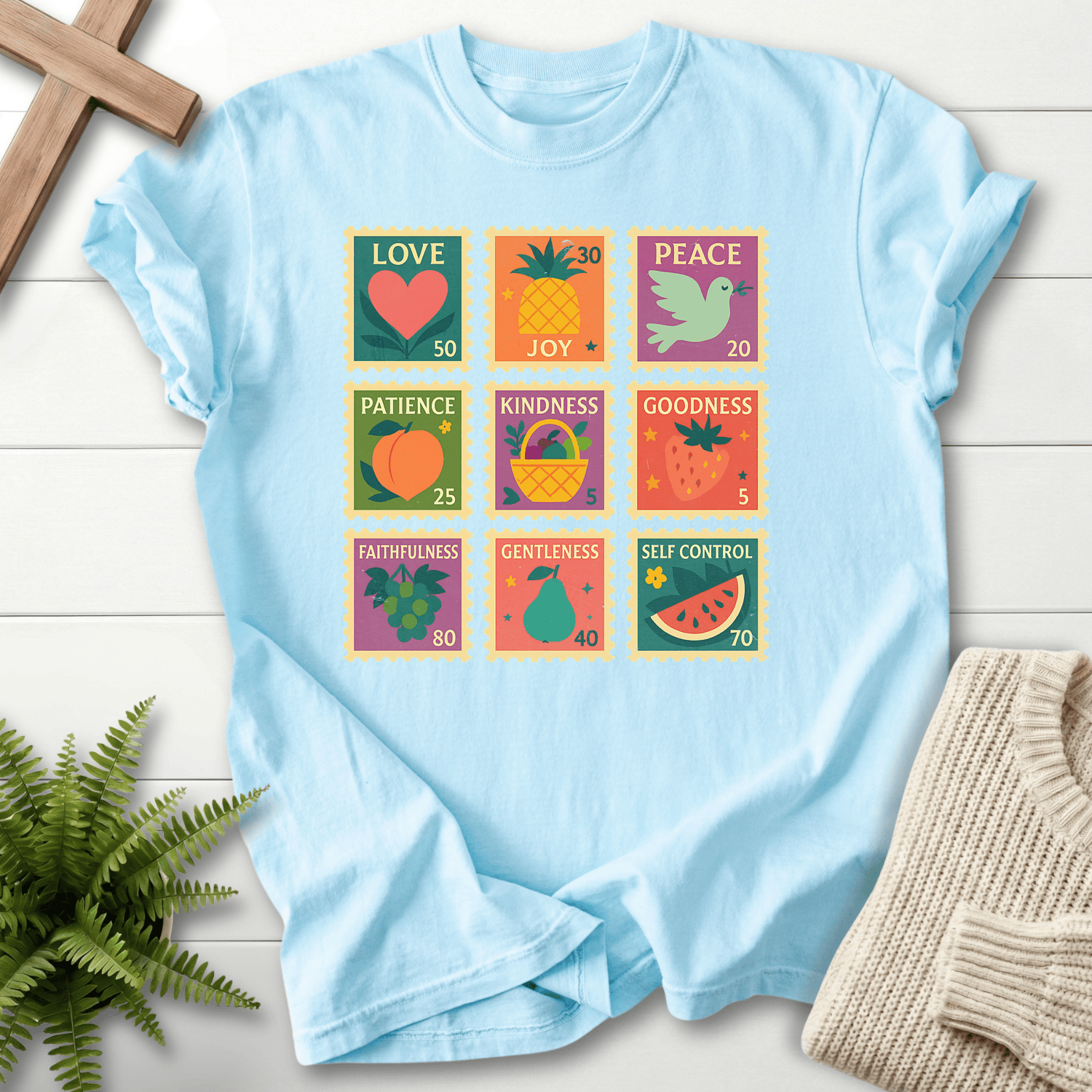 Chambray women's faith t-shirt with a colorful stamp grid and the Fruit of the Spirit, by She Wears Faith.