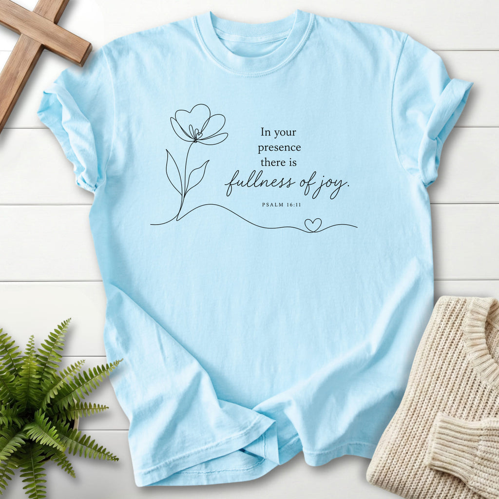 Flatlay of a Chambray Christian shirt with flower artwork with "Fullness of Joy T-Shirt" Psalm 16:11.