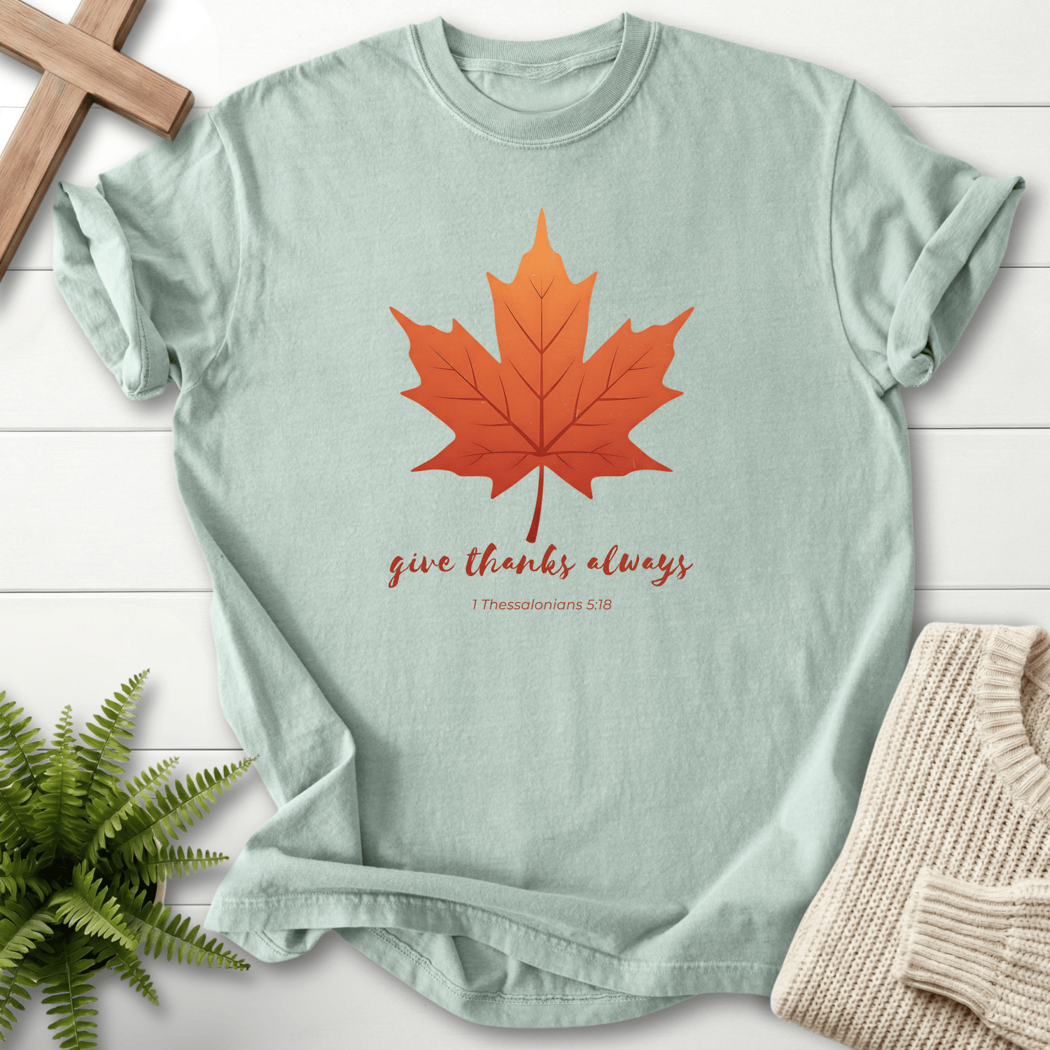 Bay blue Christian t-shirt for women with a fall leaf motif and 'Give Thanks Always'.