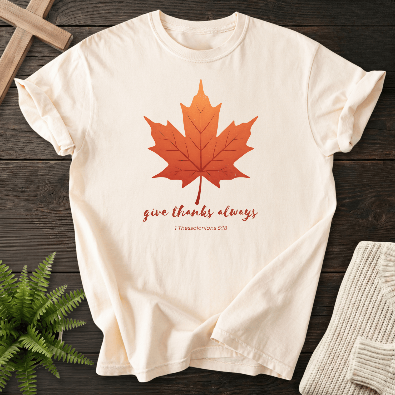 Ivory Bible verse tee with a fall maple leaf graphic and 'Give Thanks Always', inspired by 1 Thessalonians 5:18.