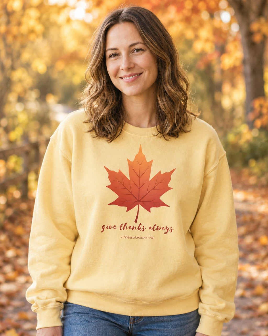 Give Thanks Always – Butter women's Christian sweatshirt, lifestyle photo in cozy autumn harvest setting – Orange maple leaf with give thanks always script – She Wears Faith