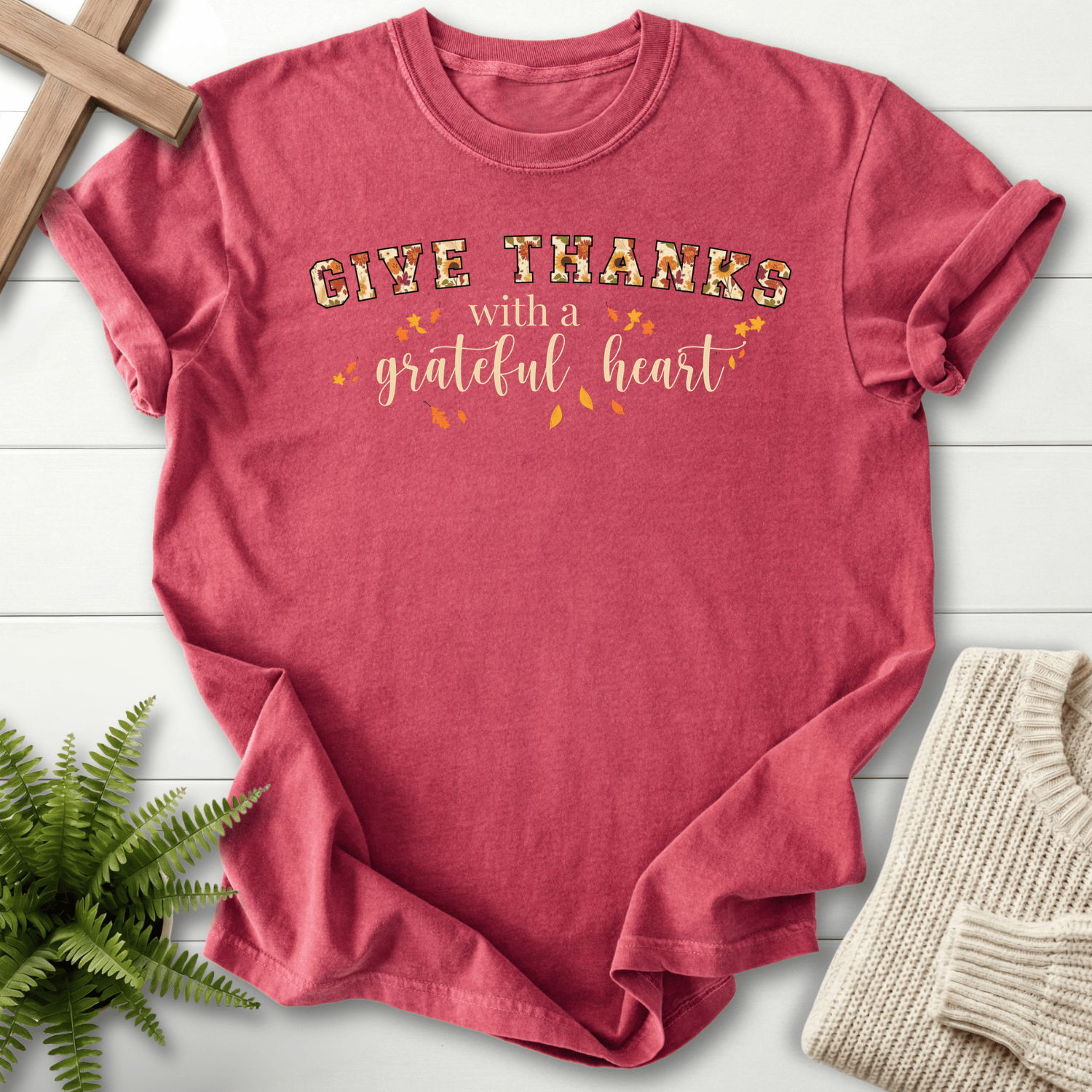 Crimson women's faith t-shirt with 'Give Thanks with a Grateful Heart' in warm autumn lettering.