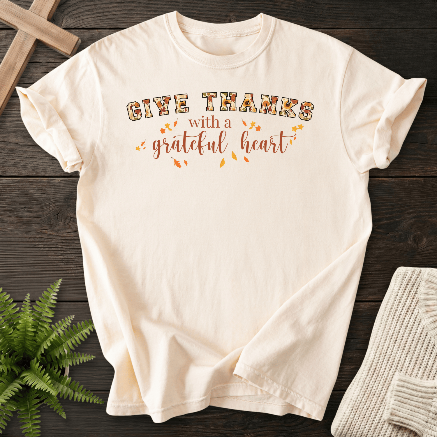 Ivory women's faith t-shirt with 'Give Thanks with a Grateful Heart' in fall harvest typography.