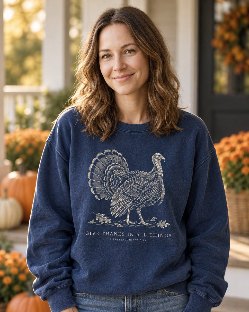 Give Thanks in All Things Turkey, True Navy women's Christian sweatshirt, lifestyle photo in cozy autumn harvest setting, Line art turkey with GIVE THANKS IN ALL THINGS, She Wears Faith
