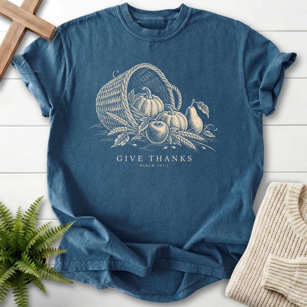 Flat lay of a Midnight Comfort Colors 1717 garment-dyed Christian tee featuring "Give Thanks Psalm 107:1 T-Shirt" Thanks Psalm 107:1.