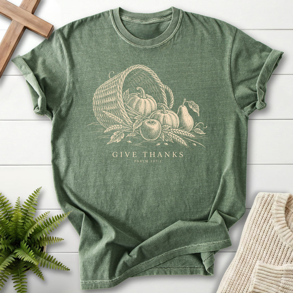 Flatlay of a Moss Christian graphic tee with "Give Thanks Psalm 107:1 T-Shirt" Thanks Psalm 107:1.