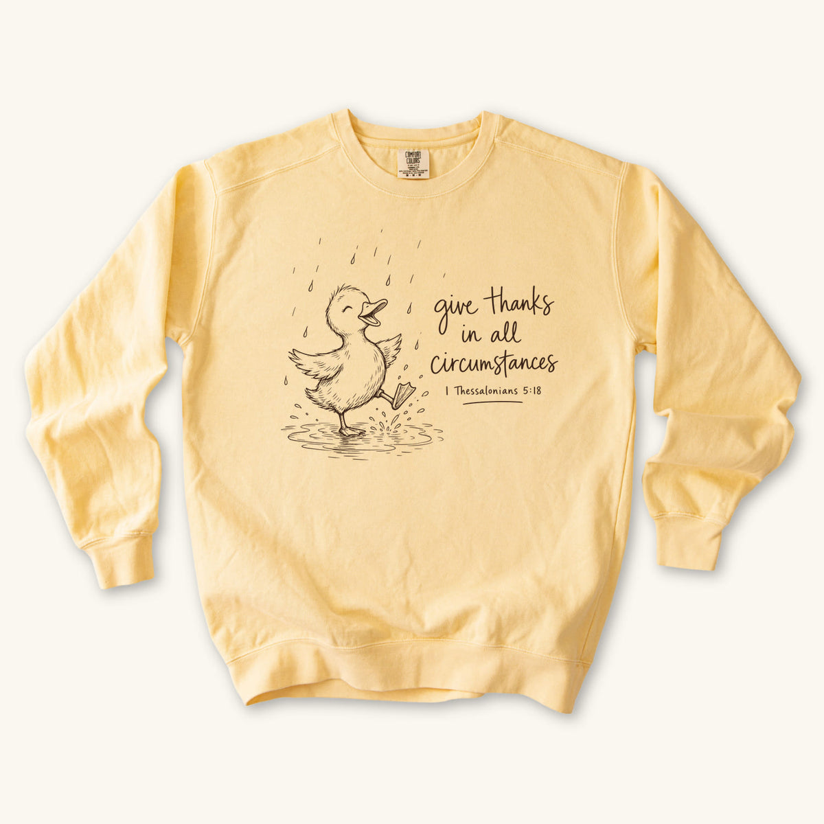 Butter Give Thanks Rainy Day Duck sweatshirt flat lay mockup, 1 Thessalonians 5:18 Christian apparel for women