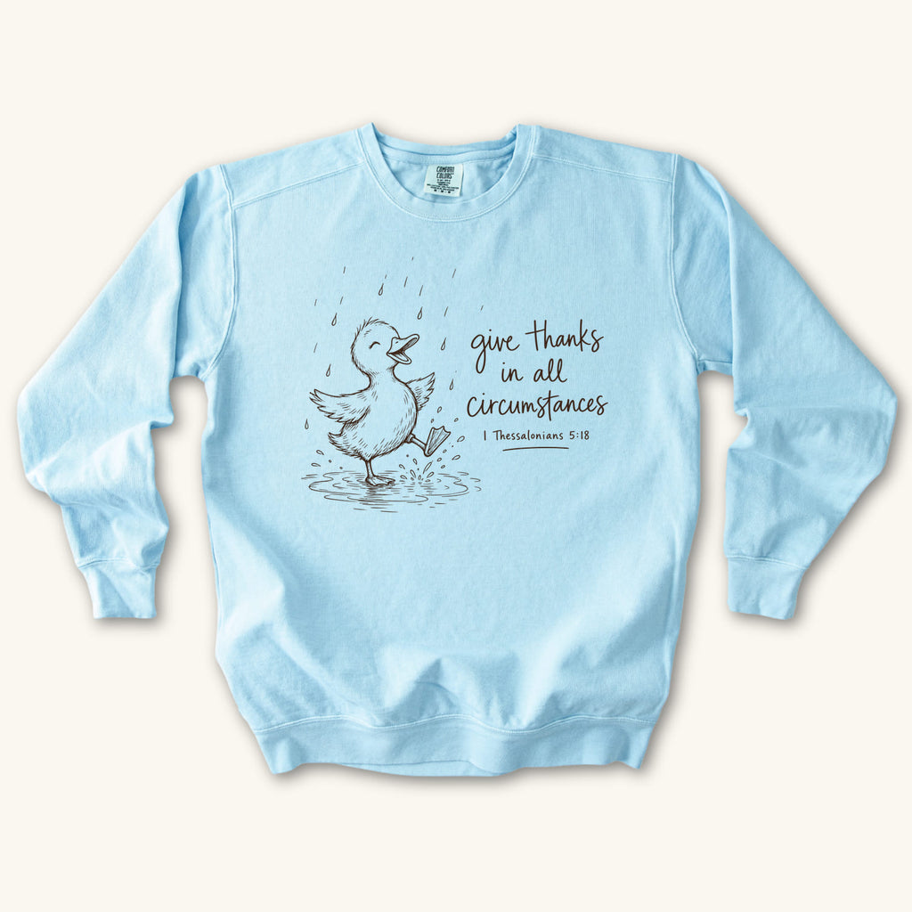 Chambray Give Thanks Rainy Day Duck sweatshirt flat lay mockup, 1 Thessalonians 5:18 Christian apparel for women