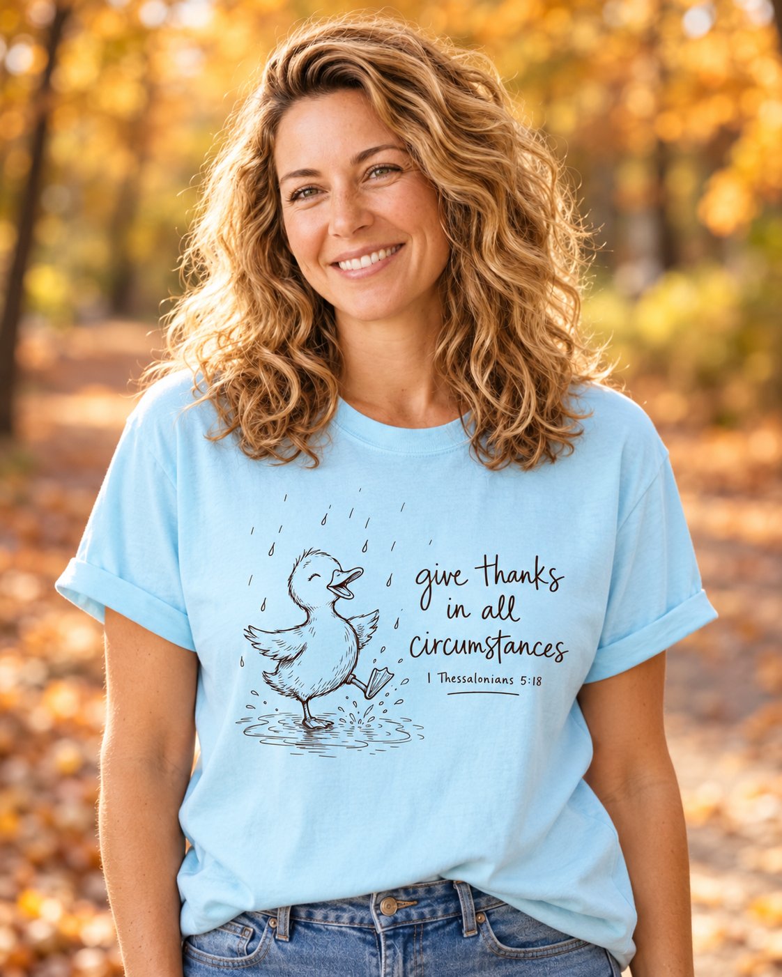 Give Thanks Rainy Day Duck, Chambray women's Christian tee, lifestyle photo in cozy autumn harvest setting, rainy day duck with give thanks in all circumstances, She Wears Faith