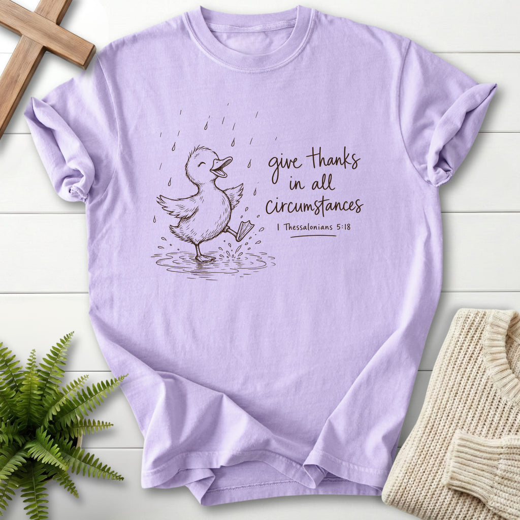 Orchid Give Thanks Rainy Day Duck T-shirt flat lay mockup, 1 Thessalonians 5:18 Christian apparel for women