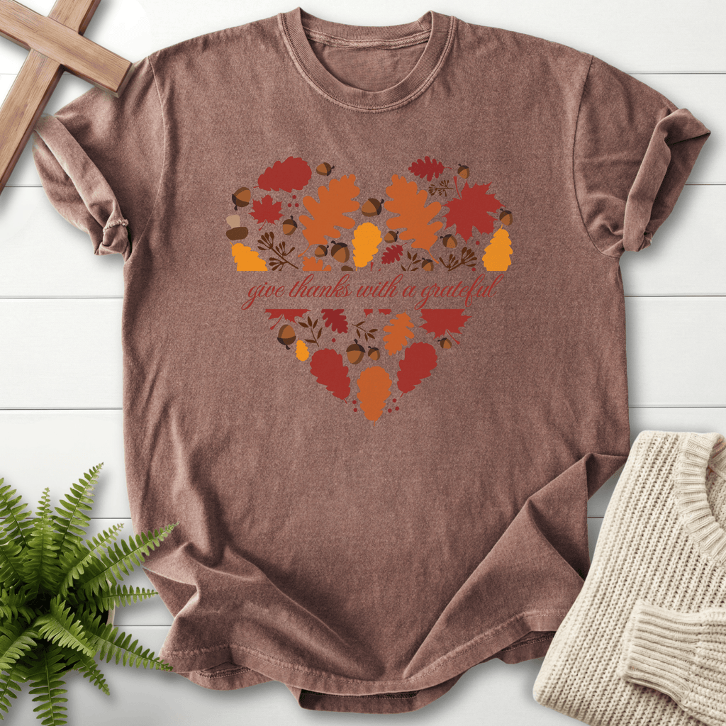 Espresso women's faith t-shirt with a fall botanicals heart motif and 'give thanks with a grateful' cursive print.