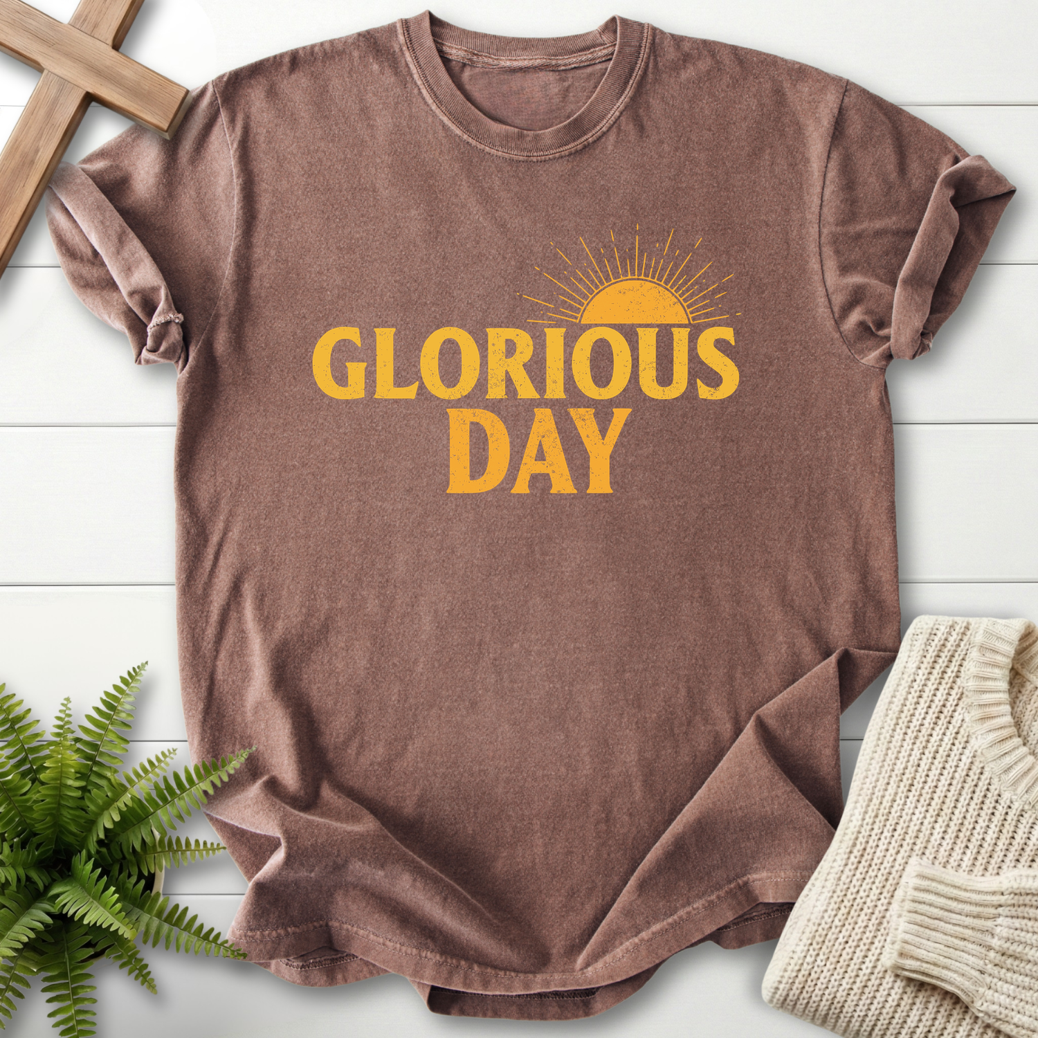 Espresso women's faith t-shirt with vintage gold 'Glorious Day' lettering and a rising sun illustration.