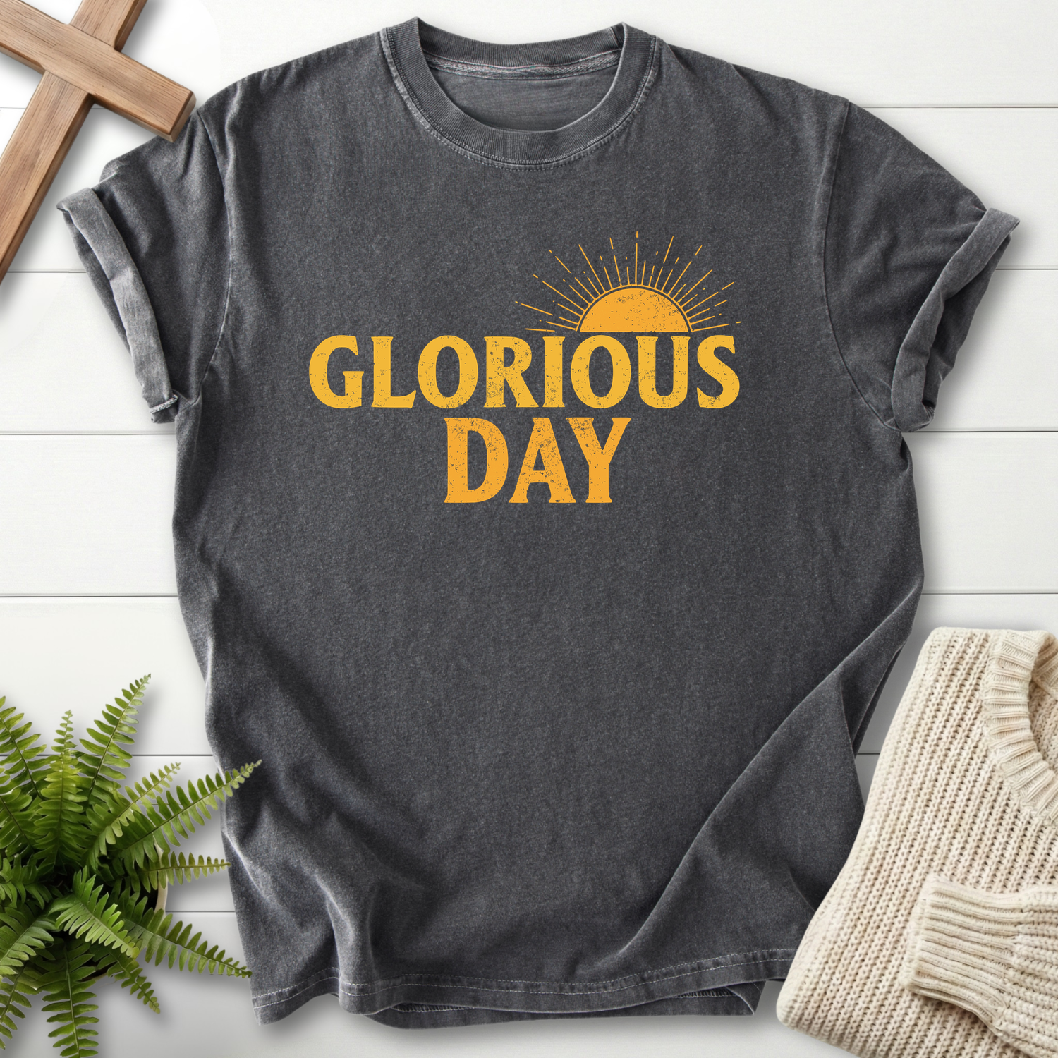 Pepper gray women's faith t-shirt with 'Glorious Day' in vintage gold lettering and a sunburst motif.