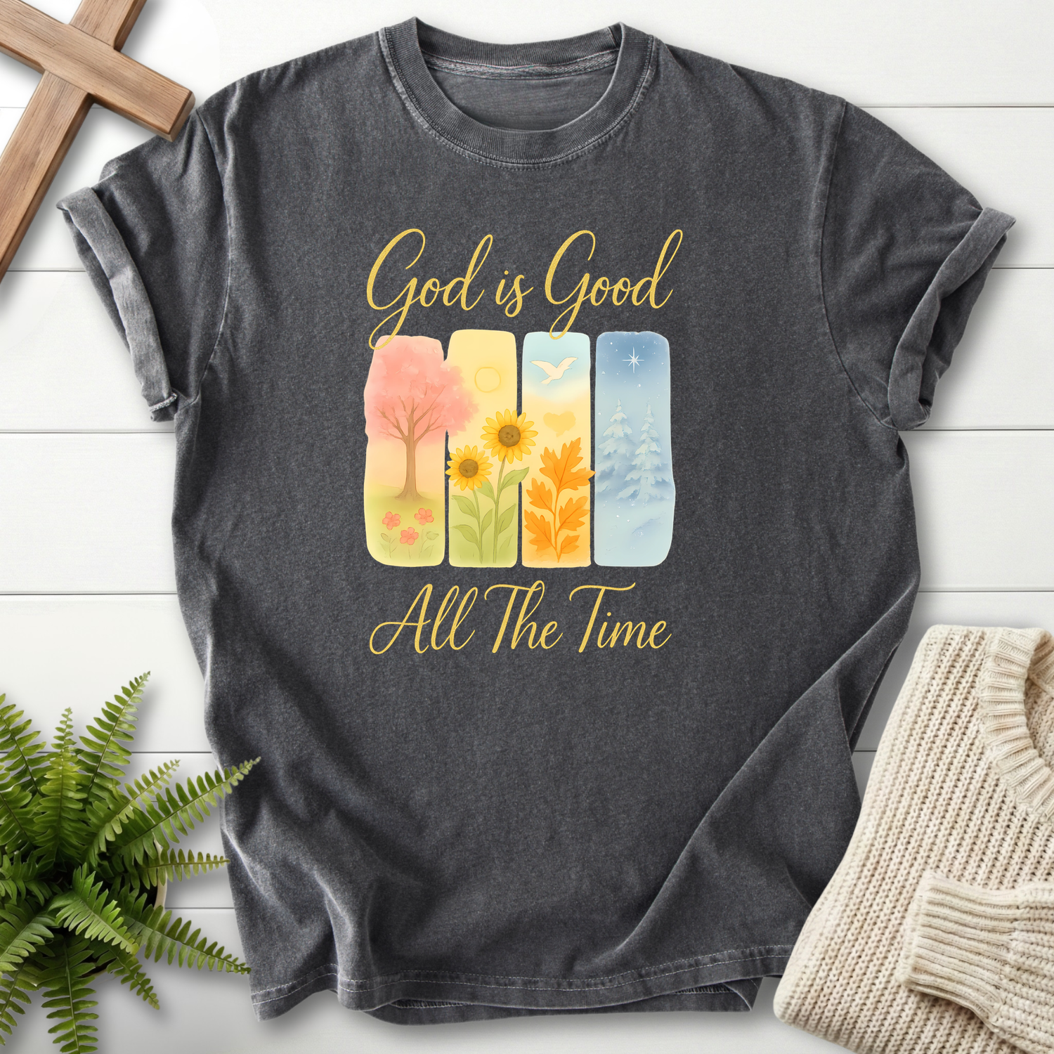 Pepper women's faith t-shirt with a four-seasons watercolor motif and 'God is Good All The Time'.