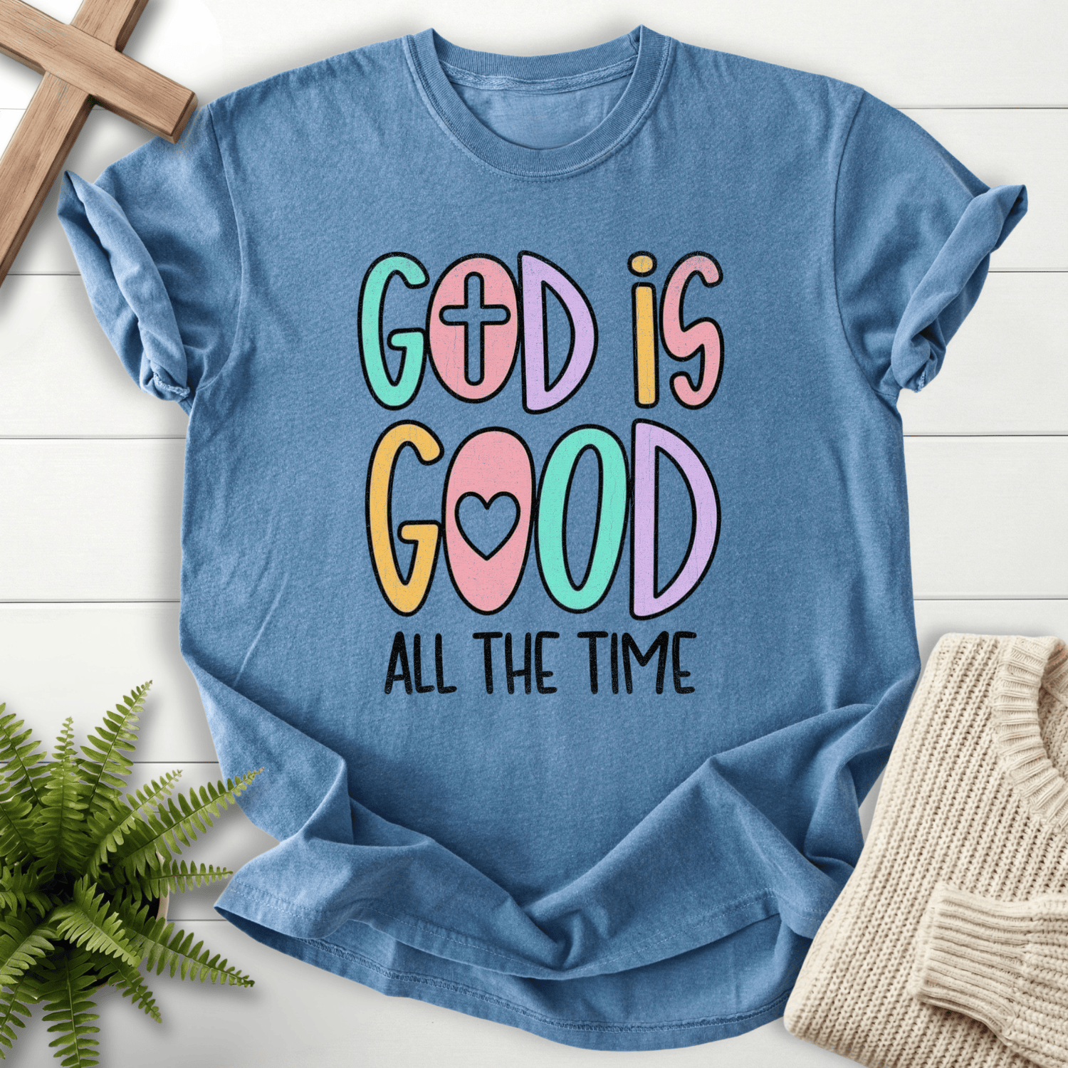 Blue Jean women's faith t-shirt with playful 'God Is Good All The Time' bubble letters in pastel colors, Comfort Colors 1717.