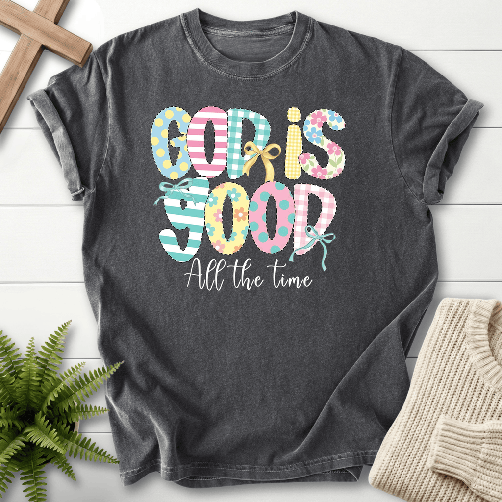 Pepper gray women's faith t-shirt with quilted patchwork 'God Is Good' letters and 'All the Time' script.