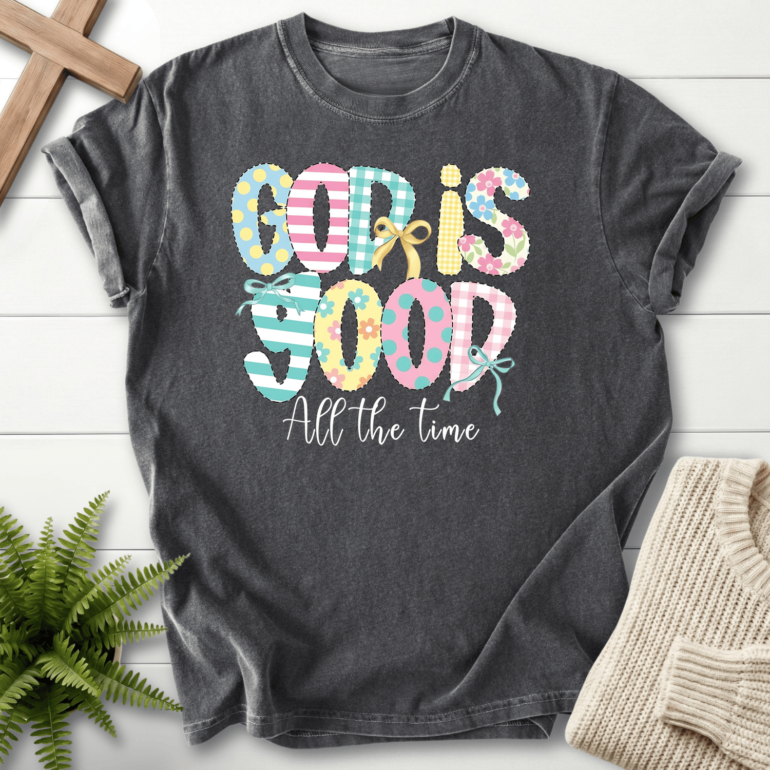 Pepper gray women's faith t-shirt with quilted patchwork 'God Is Good' letters and 'All the Time' script.