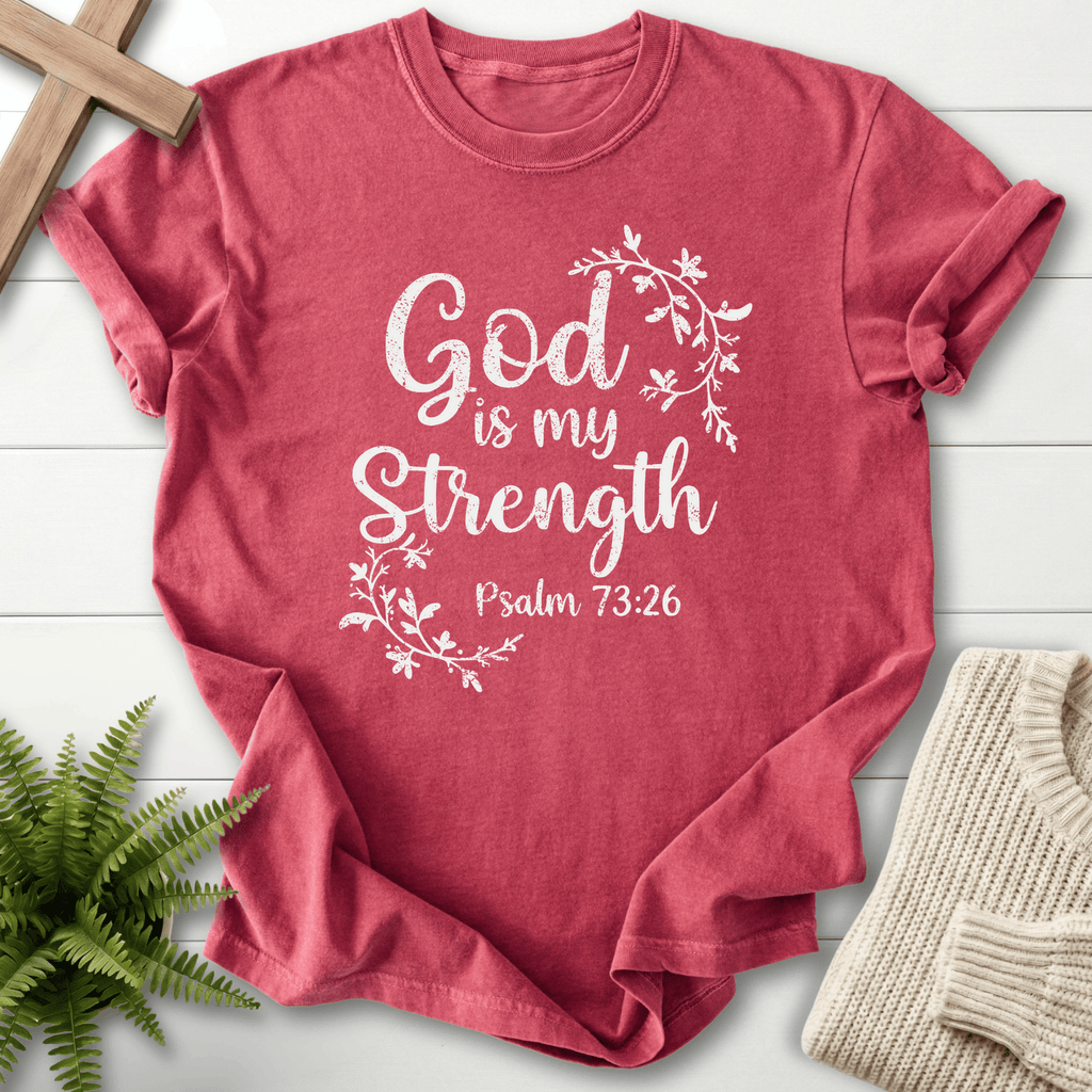 Crimson Bible verse tee with a vine leaf wreath and distressed white 'God is my Strength', inspired by Psalm 73:26.