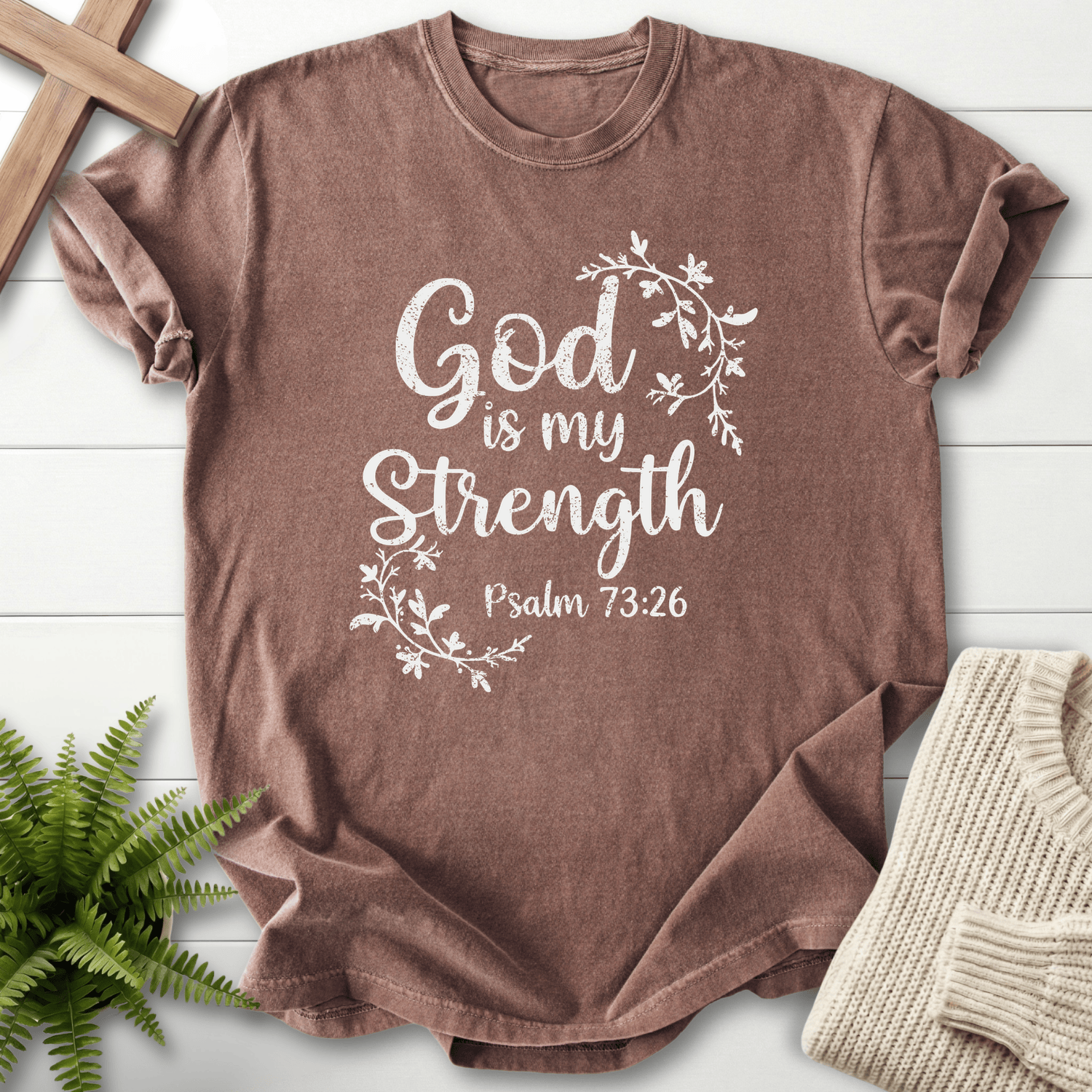 Espresso Bible verse tee with a leafy vine border framing 'God is my Strength', inspired by Psalm 73:26.