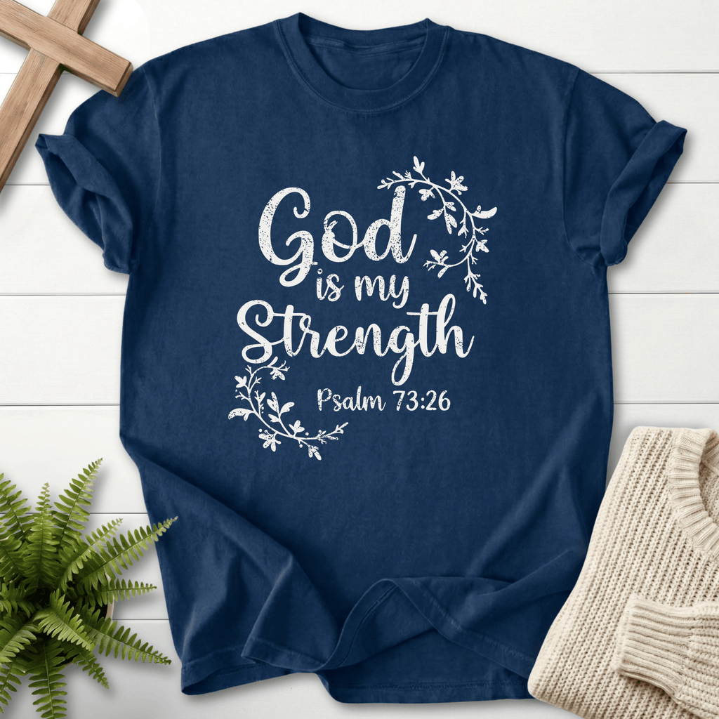 Navy Bible verse tee with white 'God is my Strength' script wrapped in a delicate vine wreath, inspired by Psalm 73:26.