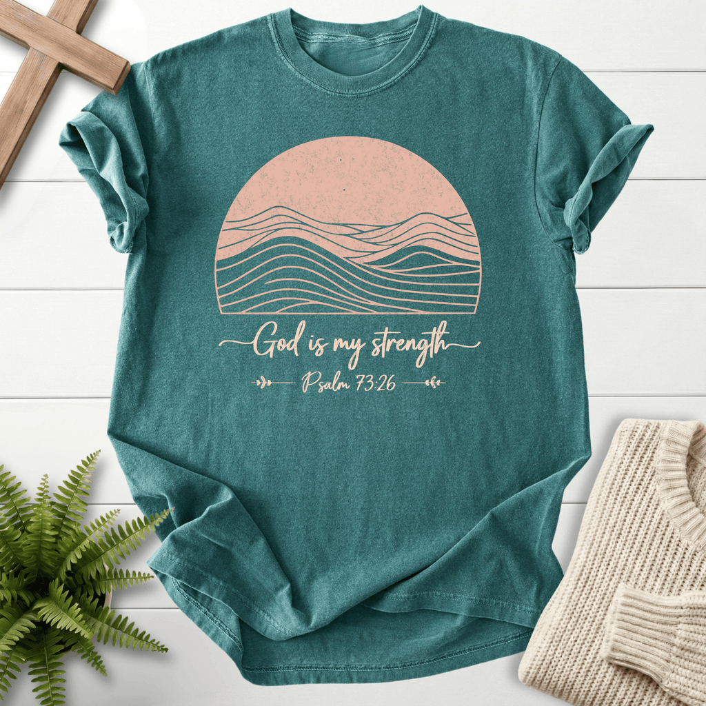 Blue Spruce Bible verse tee with mountain sunset line art and 'God is My Strength', inspired by Psalm 73:26.