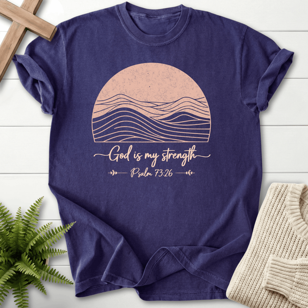 Grape Bible verse tee with a retro sun and mountain silhouette graphic and 'God is My Strength', inspired by Psalm 73:26.