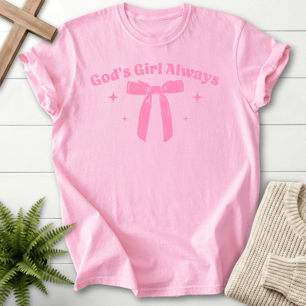 Blossom pink women's faith t-shirt with 'God's Girl Always' text and a ribbon bow with sparkles, Comfort Colors 1717.