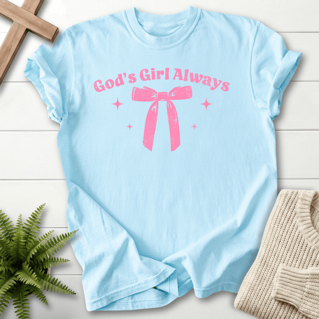 Chambray women's faith t-shirt with 'God's Girl Always' and a large illustrated ribbon bow, Comfort Colors 1717.