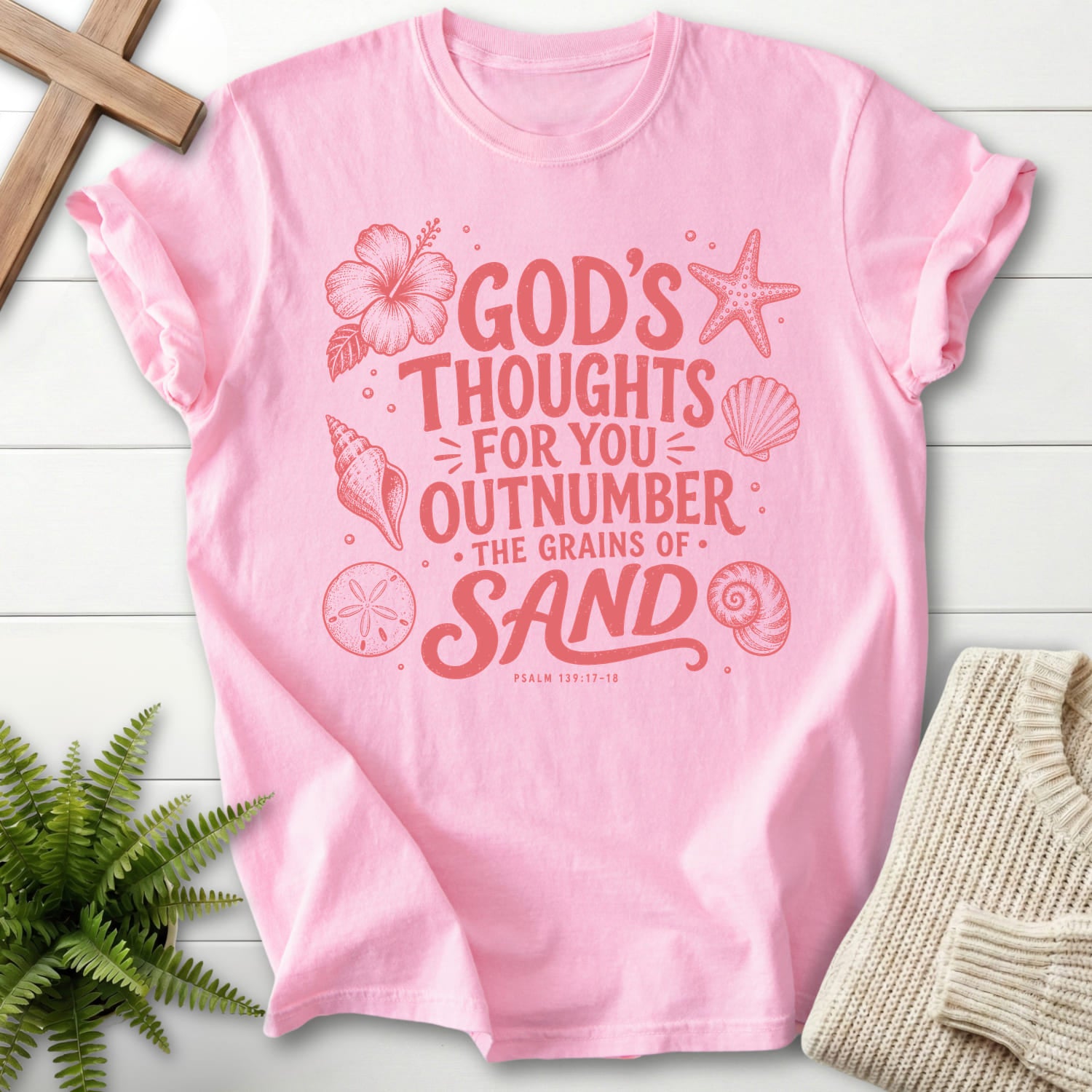 Flatlay of a Blossom Comfort Colors 1717 Christian graphic tee with flower artwork with "God's Thought For You Outnumber T-Shirt" Psalm 139:17-18.