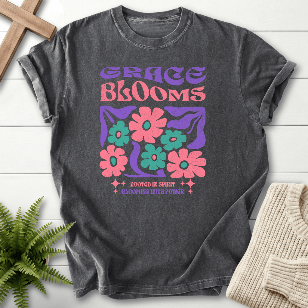 Pepper women's faith t-shirt with bold retro 'Grace Blooms' and a colorful daisy print in purple and pink.