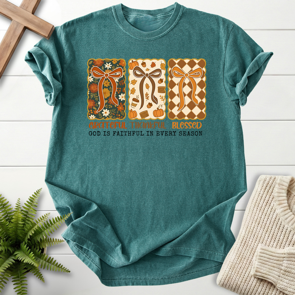 Blue Spruce women's faith t-shirt with pumpkin and plaid bow illustrations and 'Grateful Thankful Blessed'.