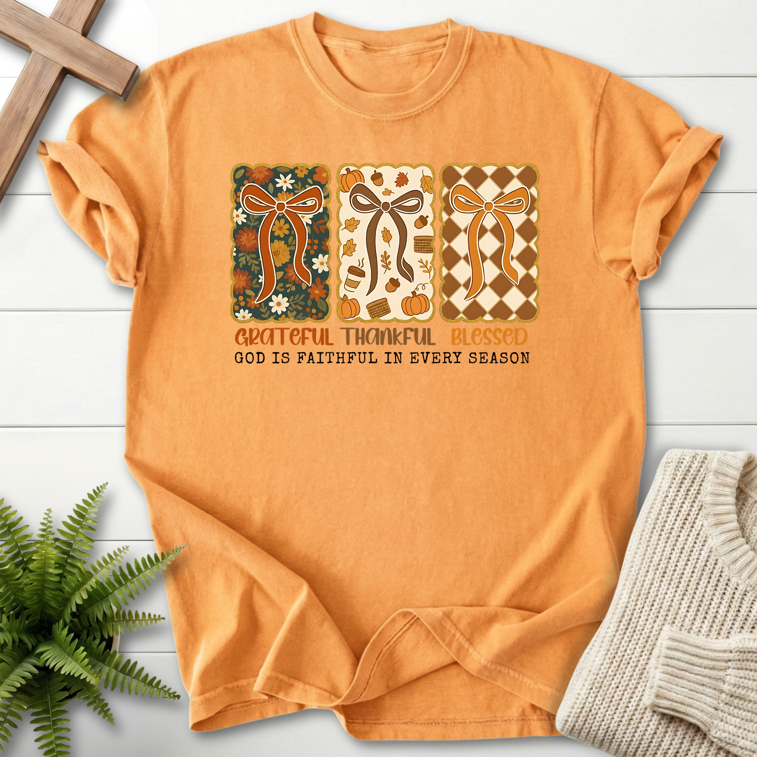 Citrus women's faith t-shirt with three patterned ribbon bow frames and 'Grateful Thankful Blessed' in autumn tones.