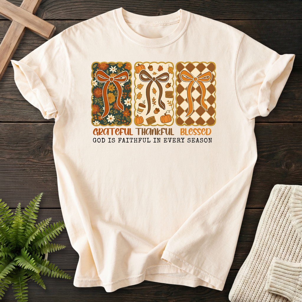 Ivory women's faith t-shirt with three fall bow panels and 'Grateful Thankful Blessed, God is Faithful in Every Season'.